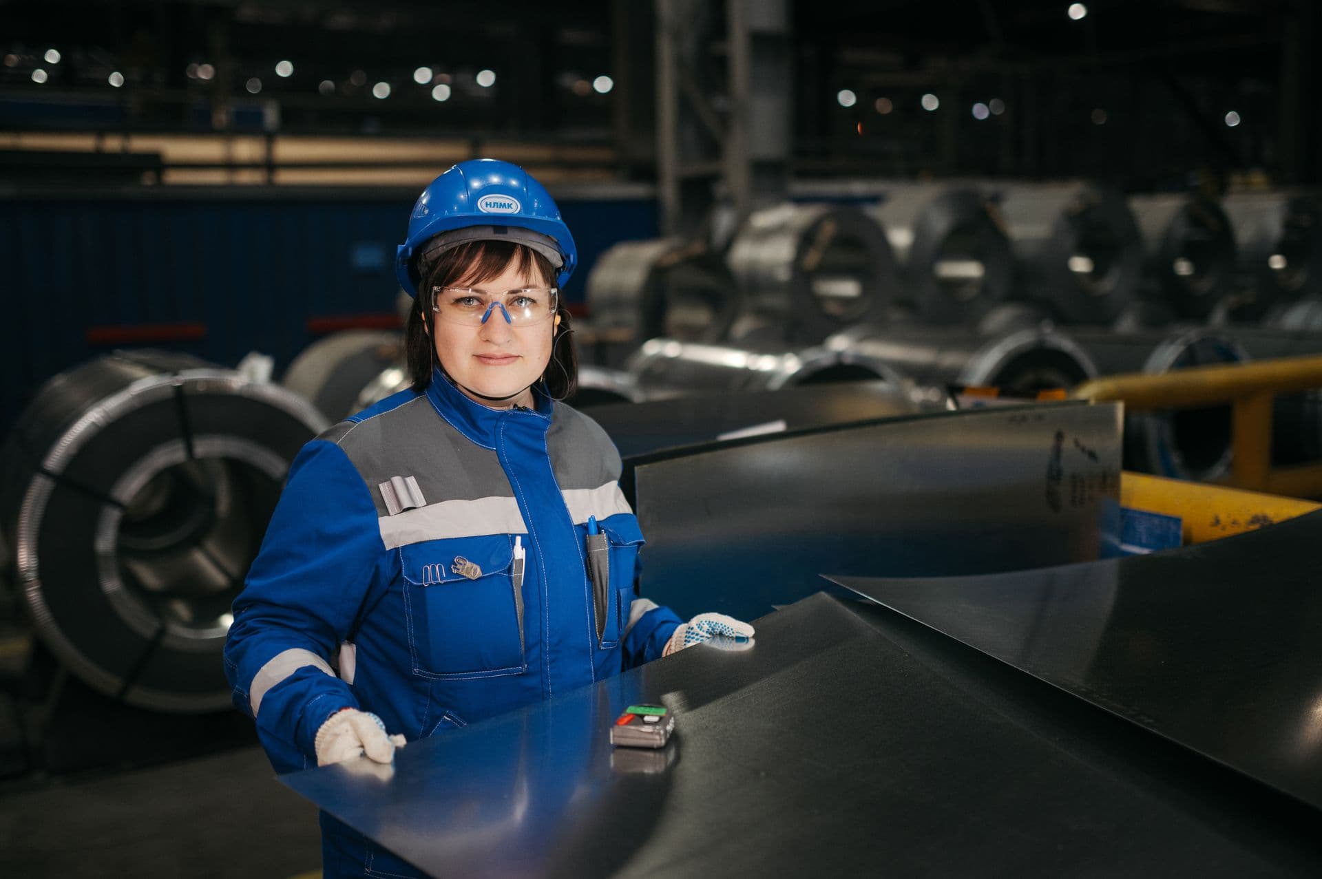 Inspector checking finished metal
