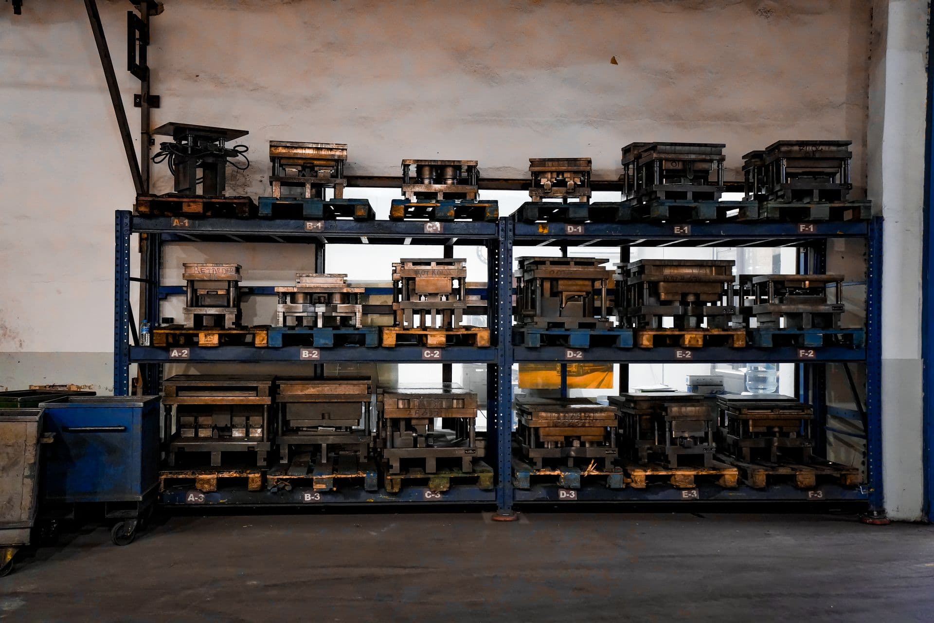 Die casting moulds on racks